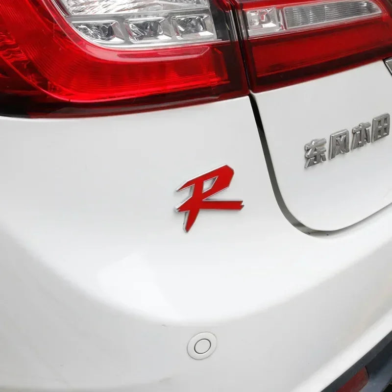 Emblema R