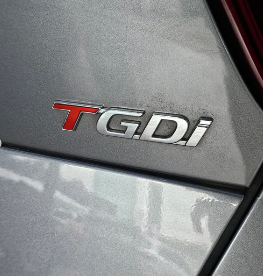 Emblema T GDi