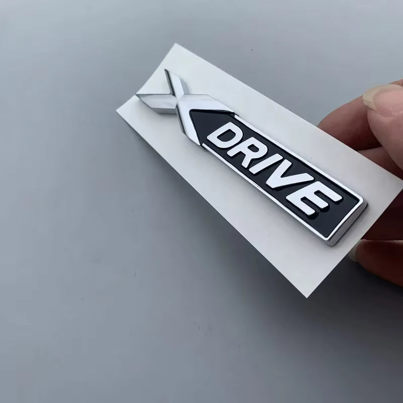 Emblema X Drive